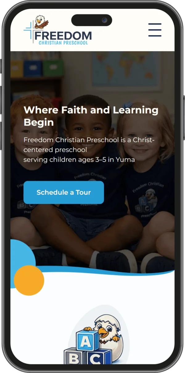 Image of the Freedom Christian Preschool Riders website on a mobile phone screen